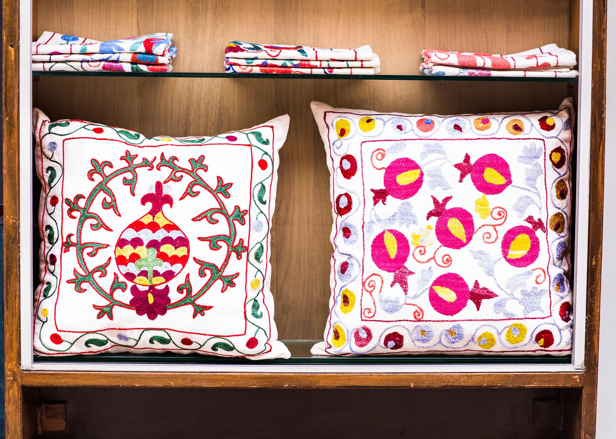 embroidered cushion with geometric pattern