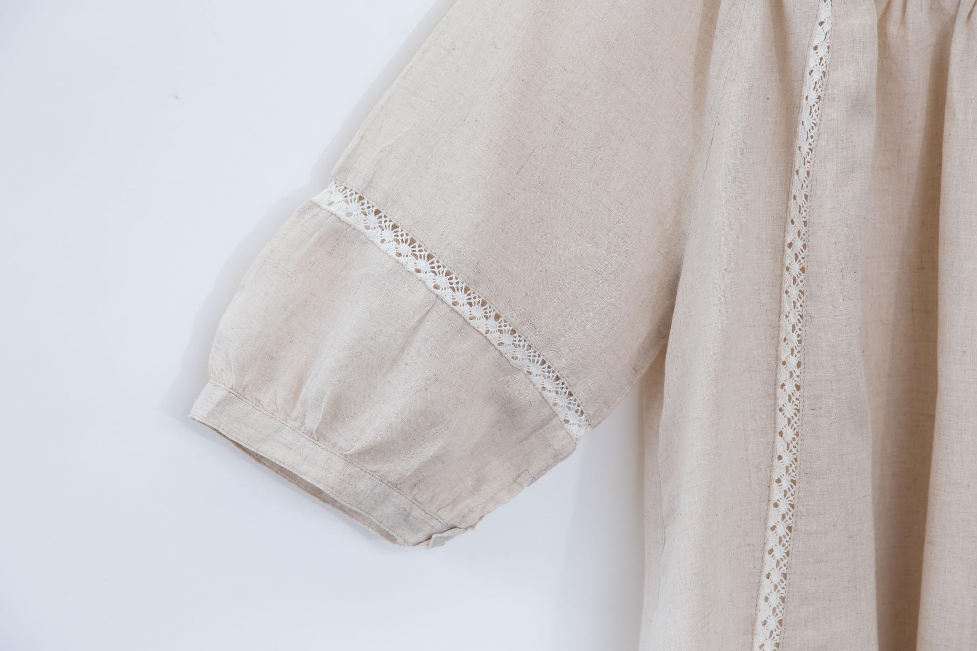 detailed floral embroidered sleeve on linen